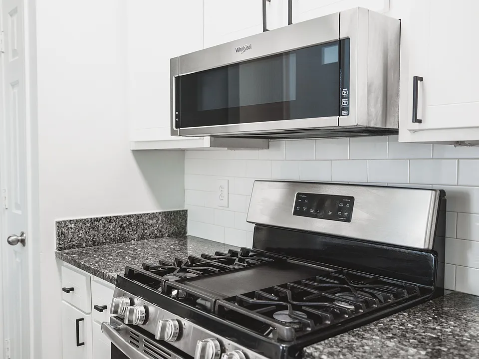 Stainless-steel appliances with granite countertops