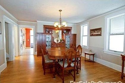Dining Space : Built in oak cabinetry and hardwood floors