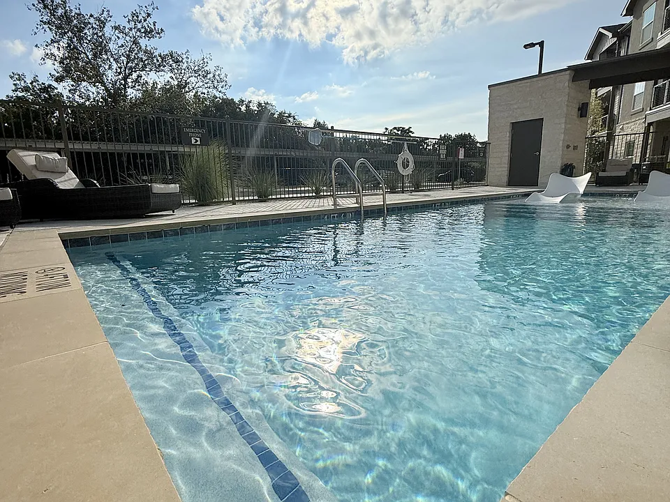 Swimming Pool with Lounge Chairs