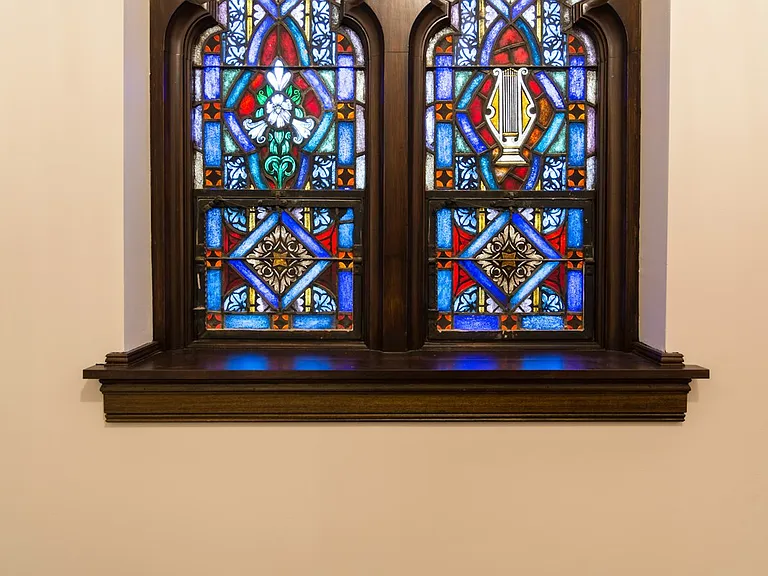 Art glass window in bedroom