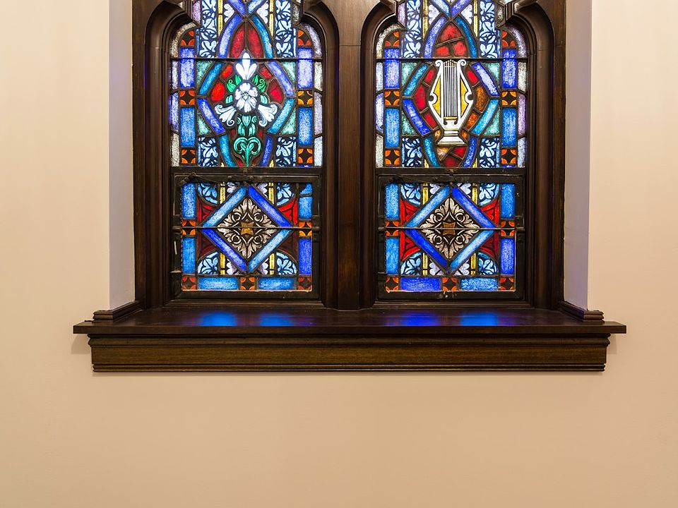Art glass window in bedroom