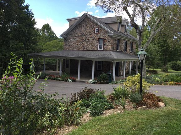 Parking area and porch with deck