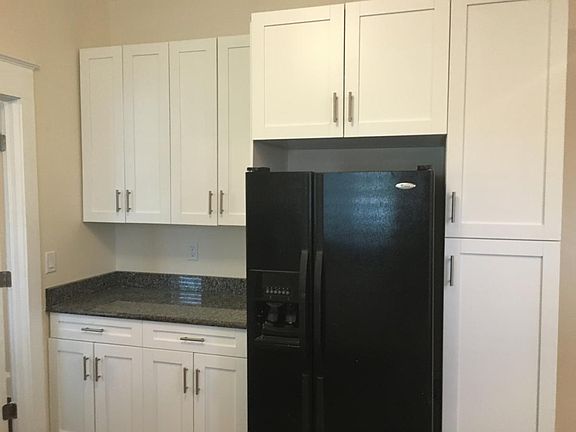 KITCHEN WITH PANTRY FOR STORAGE