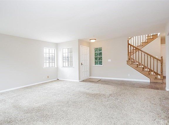 Front Door and open Living Room