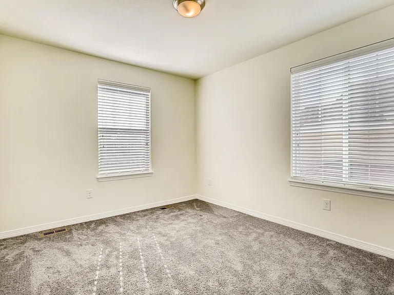 Multiple windows in all four bedrooms.