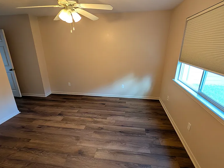 The South Bedroom is 11x12' and has a walk-in closet that is 6' x 4'. It features black-out cellular shades.