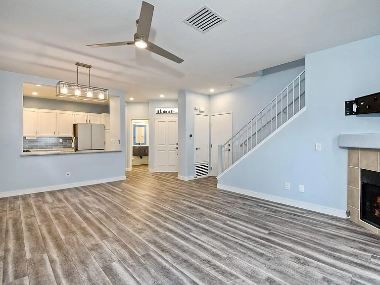 Living Room/Kitchen/Foyer/Bathroom/Front Door/Garage Door/Stairway
