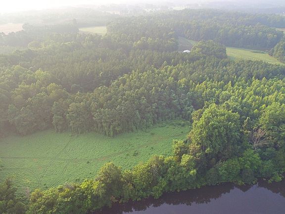Aerial view rom Lake overlooking a closer view of Tract 2 and Tract 1 (the clearning)
