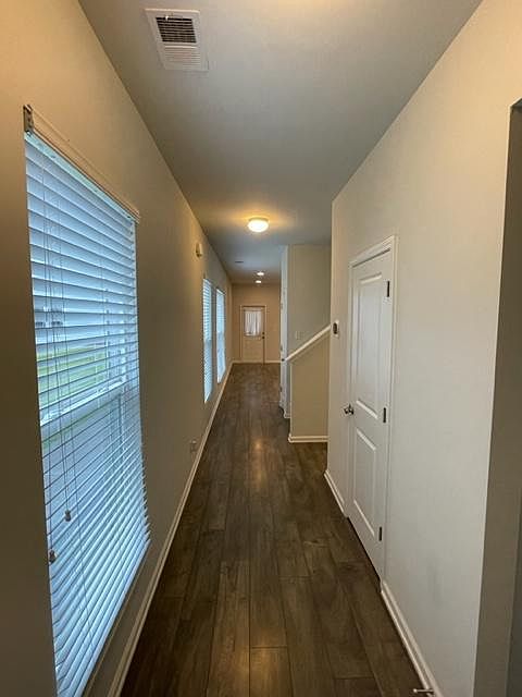 entryway with beautiful flooring throughout