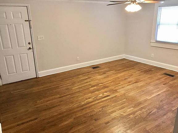 LIVING ROOM (VIEW OF FRONT DOOR)