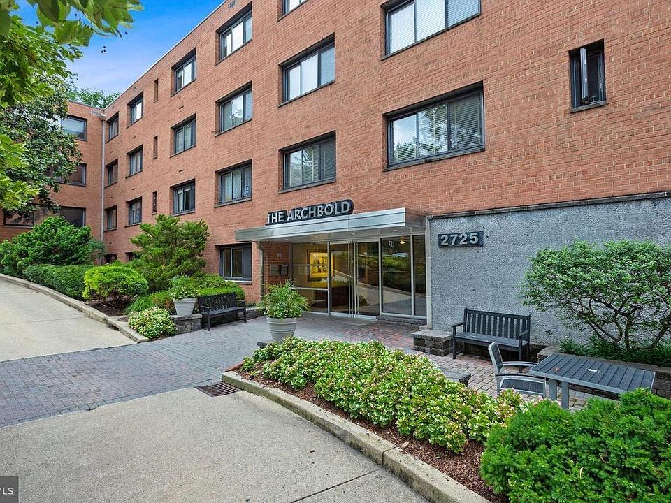 Condo 402 is behind the magnolia branches affording privacy and shade in summer.