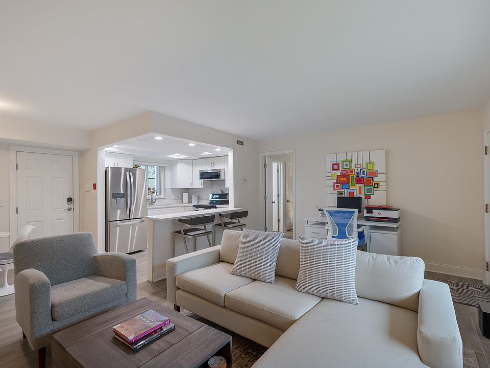 Open concept with easy access to the breakfast bar and kitchen.