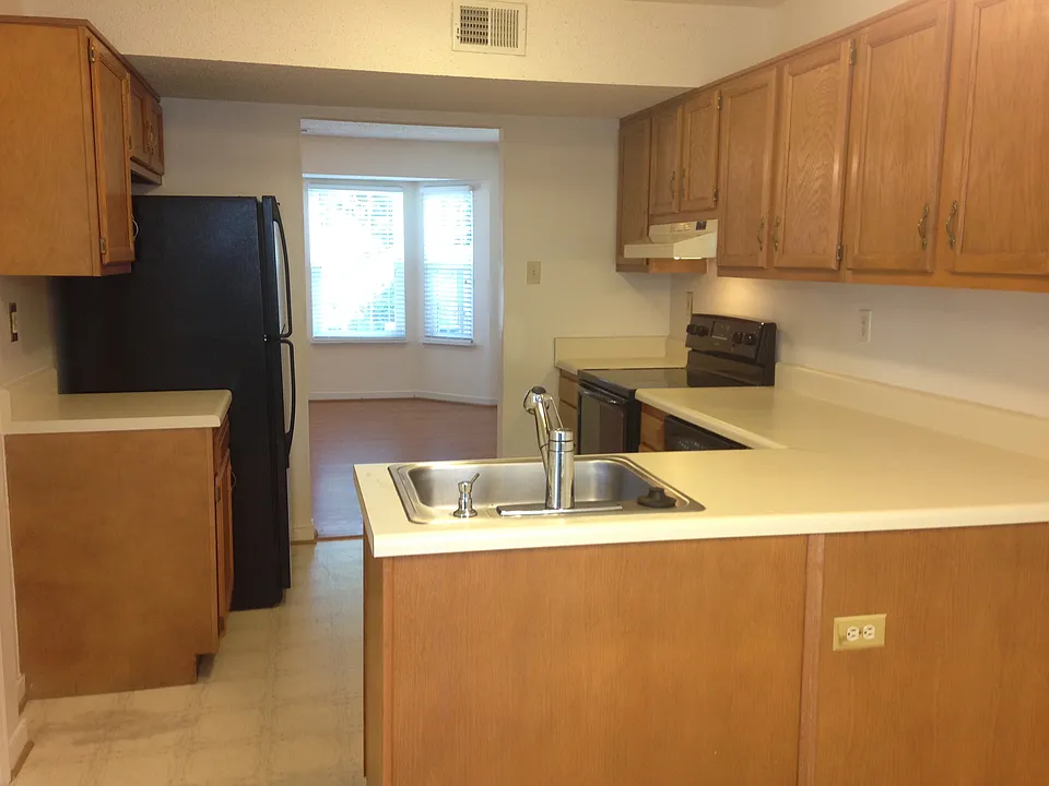 Open Kitchen with dishwasher, refrigerator, and glass top st