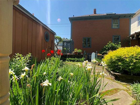 Garden - to the left is the east wall of the house for rent