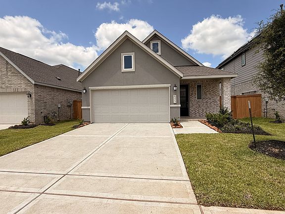 Step into elegance with this beautifully designed home featuring a spacious driveway, manicured front yard, and charming curb appeal. From the welcoming entryway to the lush green lawn and thoughtfully landscaped garden beds, this is more than a housea??i