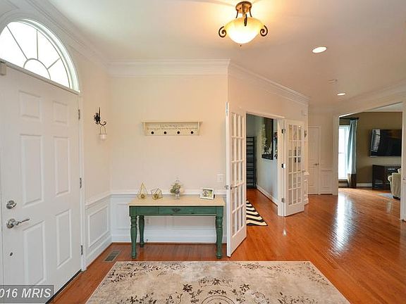 Foyer with Hardwood Flooring
