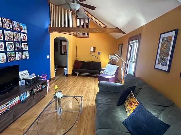 View of living room from front of house. Loft visible from living room.