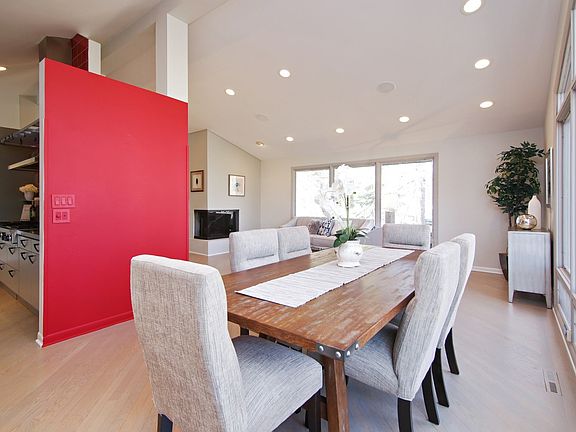 Spacious dining area conveniently located between living room and kitchen