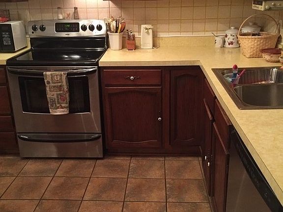 Kitchen
						:
						Stainless electric stove and dishwasher.