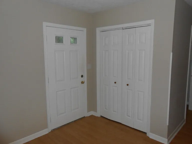 inside front entrance/ coat closet