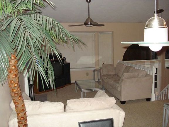 view from the dining room out to the bay window into the living room.