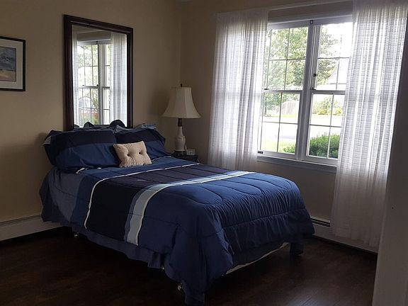 Second bedroom with large picture window.