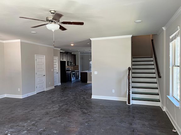 View of Kitchen and Entrance to Upstairs