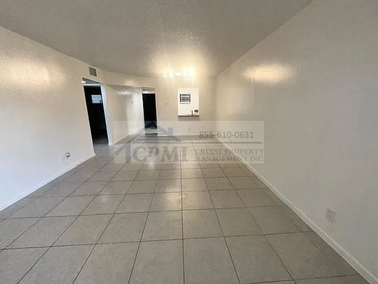 Colonial Village - 7550 Stirling Rd — Photo 32