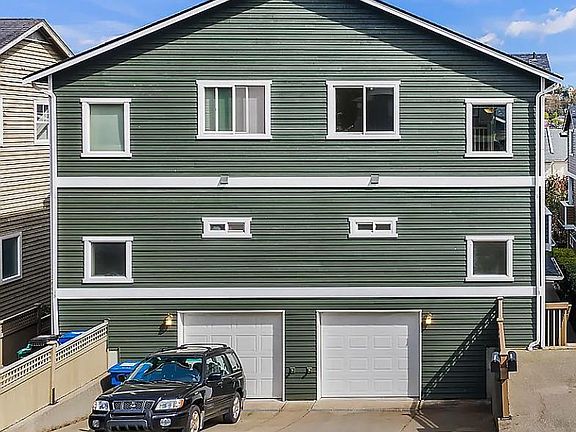 Garage Access with Driveway for Additional Parking
