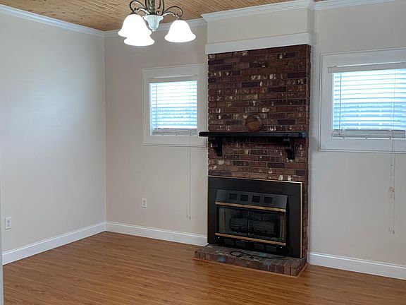 Large den with fireplace;ace