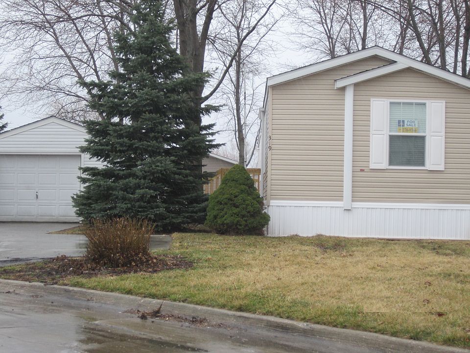 1st image of 319 SE Green Park Cir