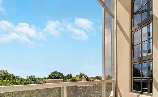 Views of trees and Santa Fe skies from the balcony of 3202 "The Edward" Loft.