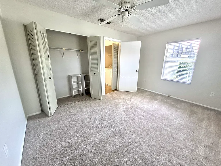 2nd Bedroom with 2 windows facing exterior of villa.