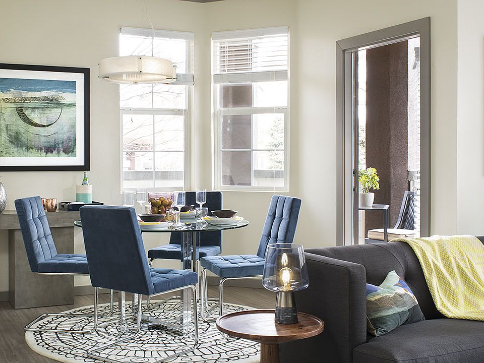 Apartment Dining room with wood floors.