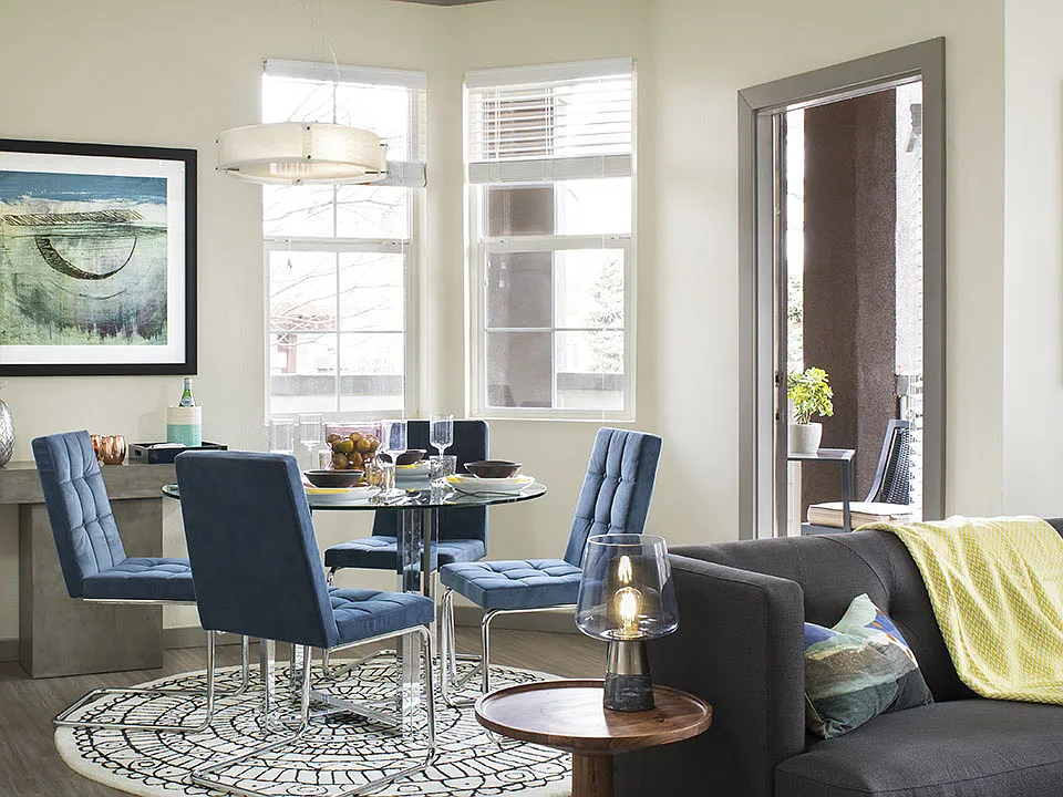 Apartment Dining room with wood floors.