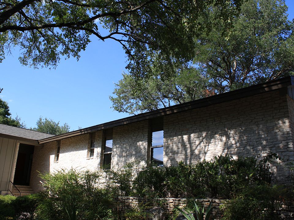 House tucked into trees 