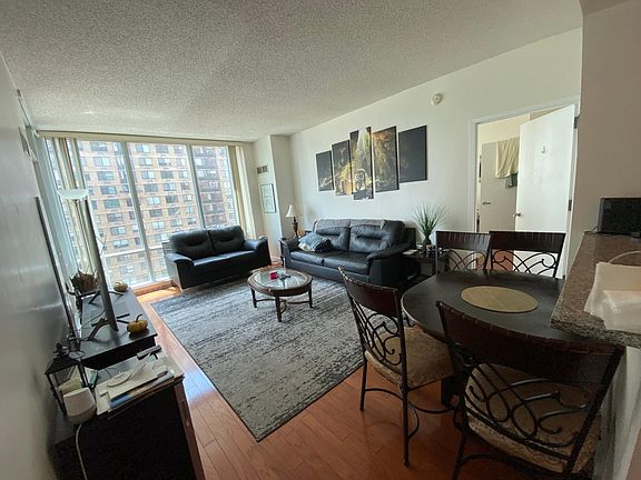 Living room with different furniture.