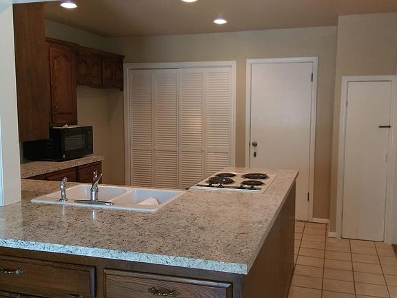 kitchen - laundry behind bifold doors