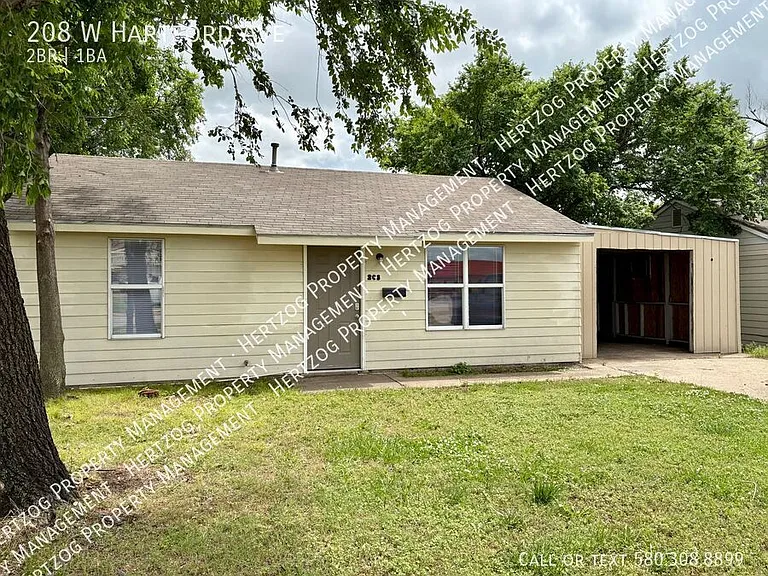 208 W Hartford Ave — Photo 1