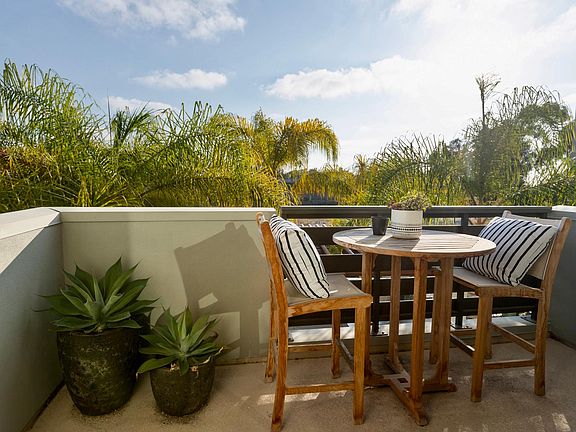 Peaceful second floor balcony perfect for morning breakfast or a evening glass of wine.