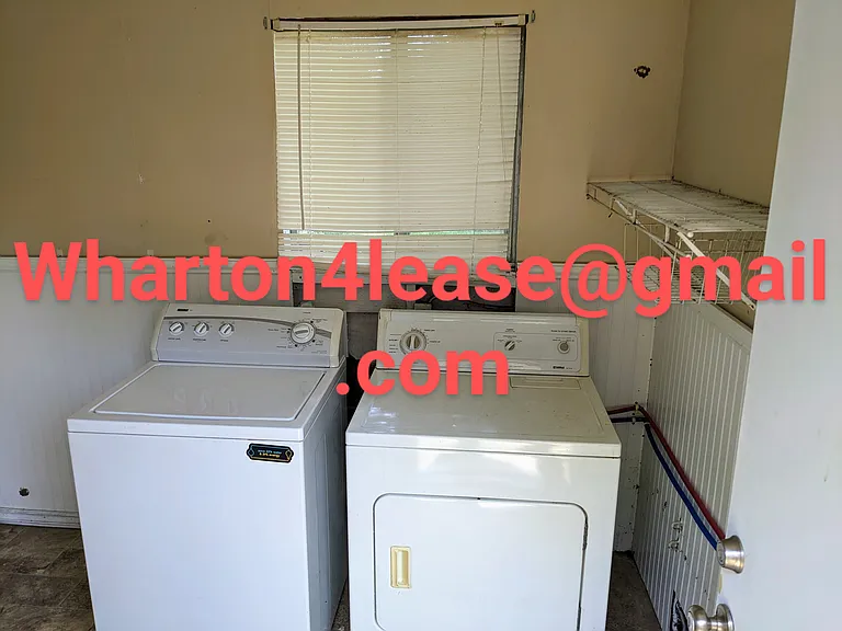 Laundry room with washer and dryer included