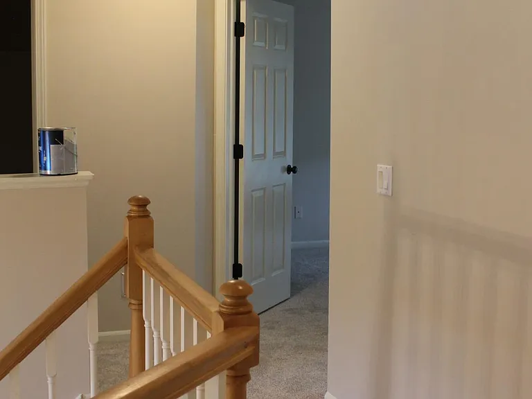 Hallway upstairs: new flooring, new paint, new light fixtures