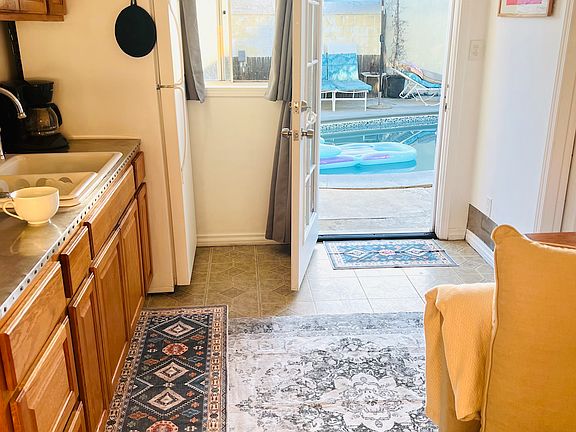 The room sits of a pool in a very tranquil quite back yard with 100% privacy walls etc. The light in the unit is bright.