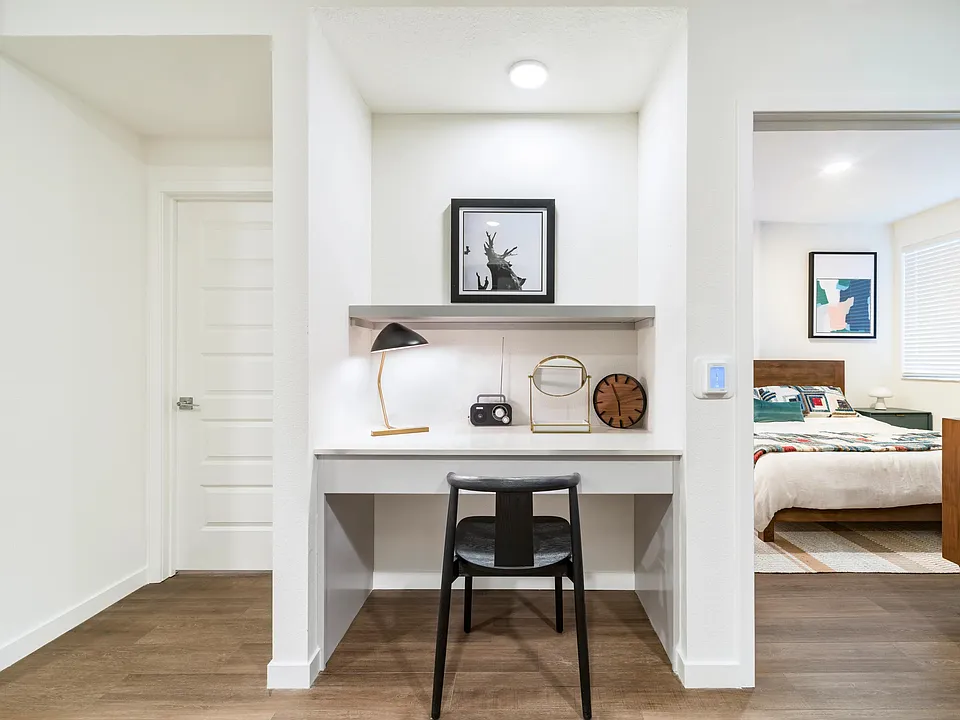 Built-in workspace with open shelving and dedicated task space, offering a convenient spot for remote work, study sessions, or daily organization.
