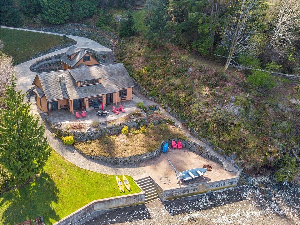 Welcome to beachfront living on North Shore of Hood Canal with your 187 feet of waterfront. Private and secluded with majestic views of the Olympic Mountains and Hood Canal. Meticulously landscaped grounds with sprinkler system and native forest. Engineered retaining walls with 2-man, 3-man and 4-man boulders.
