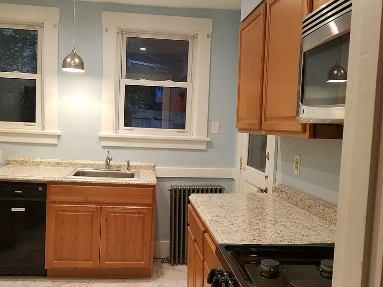 Kitchen view, new dishwasher.