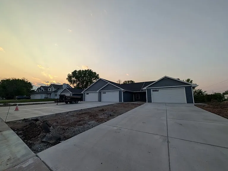 Four Plex each unit has 2 car garage