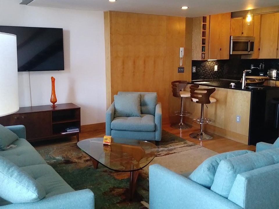 Brand new turquoise furniture. With large Samsung Smart TV.
