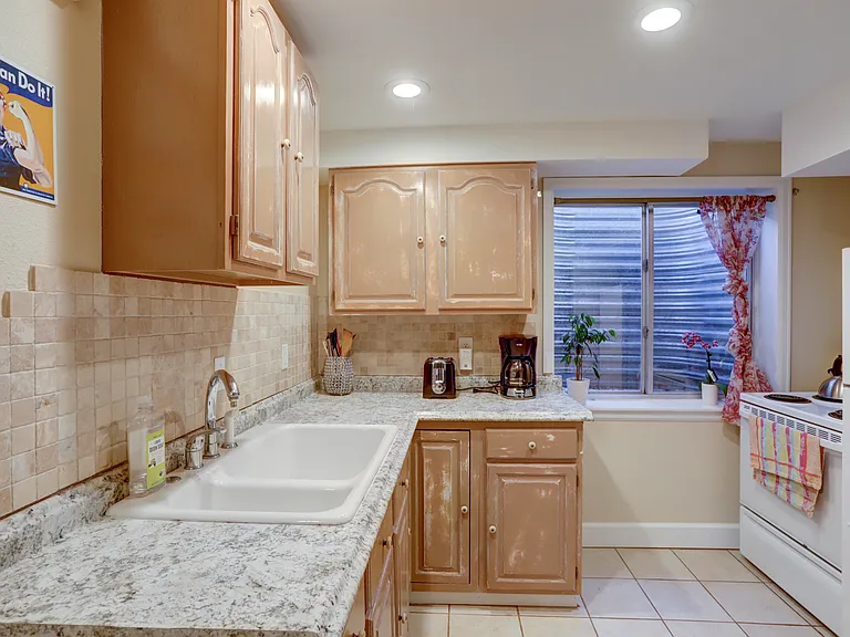 FULL KITCHEN WITH PLENTY OF CABINET SPACE