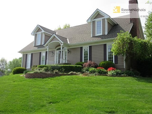 Fabulous corner lot sits up high with views of the lake.